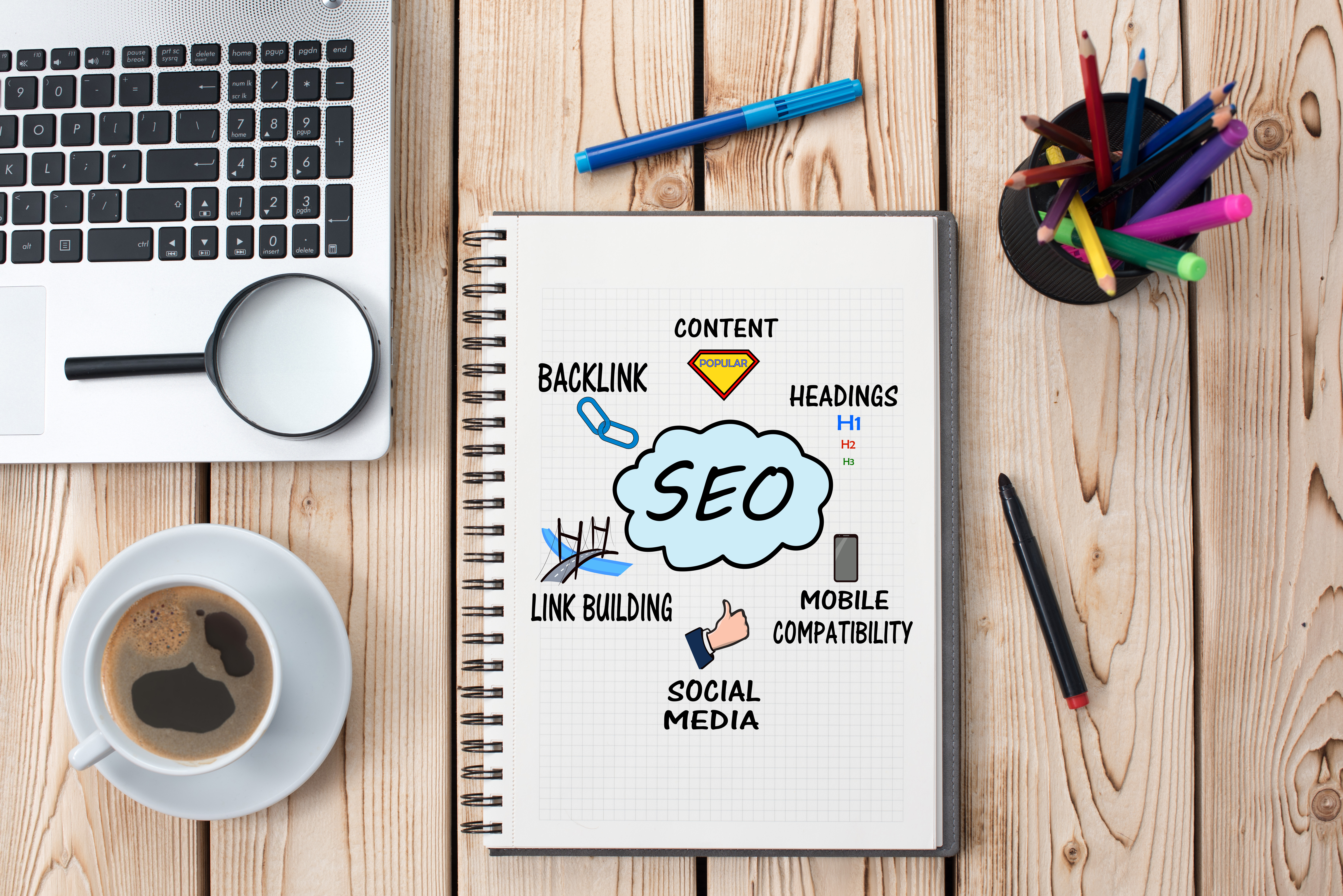 notebook with search engine optimization graphic